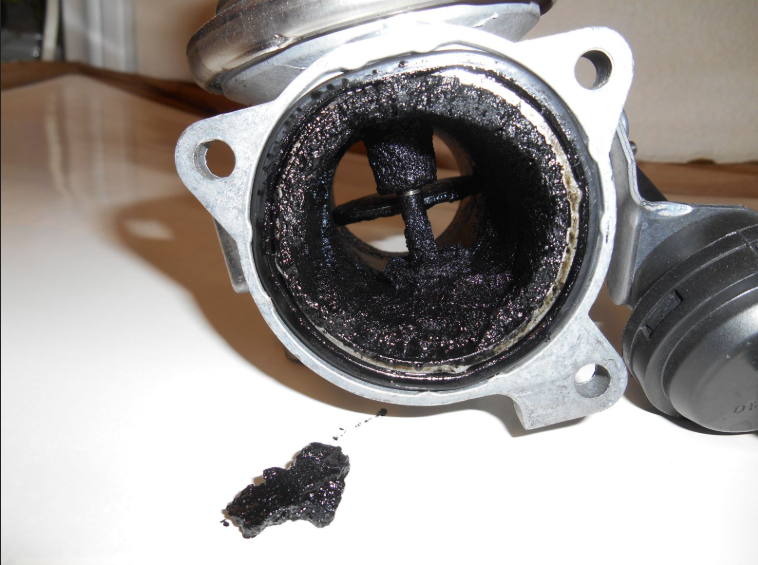 Corpo de borboleta sujo causando falha em marcha lenta